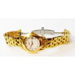 A Gucci goldtone lady's wristwatch with quartz movement and original bracelet - no box or papers