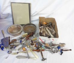 A crate containing a quantity of EPNS and other assorted cutlery, also two wine coasters