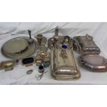 A box containing a quantity of silver plated items including trays, entree dishes and sugar