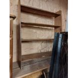 A vintage oak four shelf open bookcase