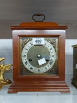 A md 20th Century polished walnut cased bracket clock with brass and silvered square dial and Smiths