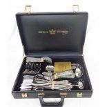 A fitted black attaché case containing a twelve place setting of SBS silver plated cutlery - with