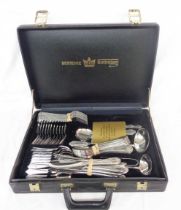 A fitted black attaché case containing a twelve place setting of SBS silver plated cutlery - with