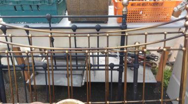 A reproduction Victorian style double bedstead - sold with another similar (side bars missing)