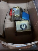Three vintage alarm clocks - sold with a small Shatz mechanical timepiece and a quartz carriage