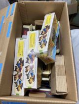 A box containing a quantity of boxed Yesteryear model cars, etc.