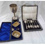 A cased pair of parcel gilt silver salts with one original spoon and two plated salt spoons - sold