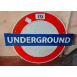 A modern painted cast iron Underground sign