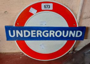 A modern painted cast iron Underground sign