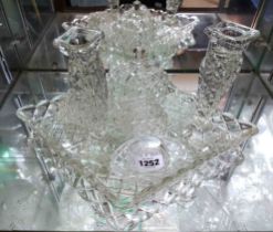 A press moulded glass dressing table set