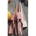 A quantity of metal fence posts