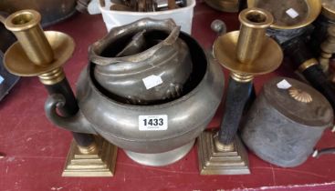 A quantity of vintage metalware including pewter items and a pair of candlesticks