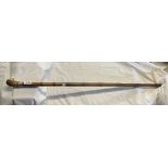 An antique bamboo walking stick with parrot handle, silver collar and ivory beak - CITES Reference