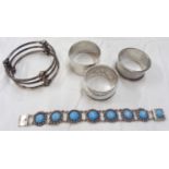 Three silver assorted napkin rings - dents - sold with a marked 925 triple ring bangle and a Codi