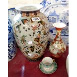 A Japanese Kutani porcelain vase of baluster form with typical hand painted decoration - sold with a