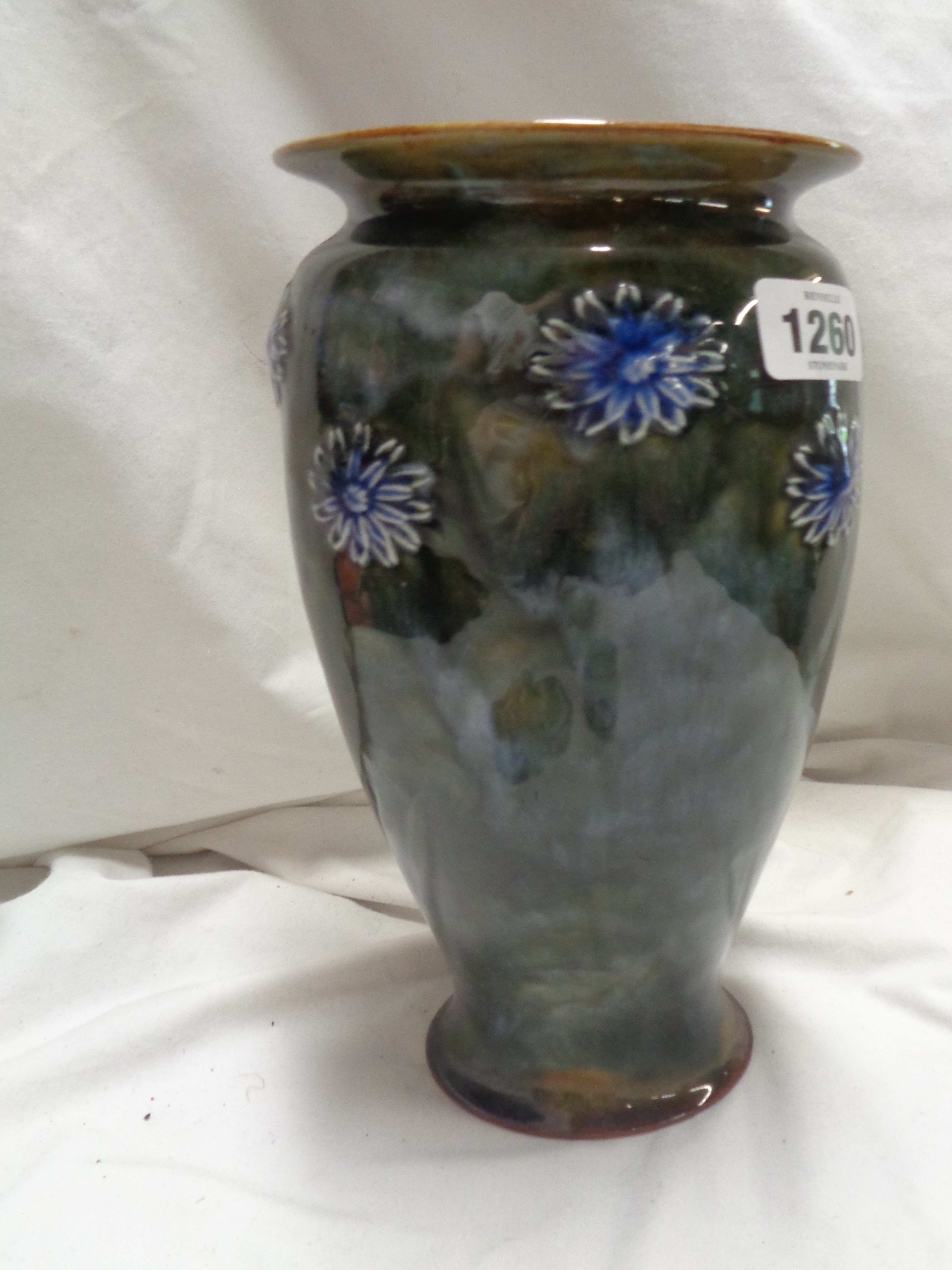 A 19th Century Doulton Lambeth stoneware vase of baluster form with applied floral sprigs on a