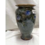 A 19th Century Doulton Lambeth stoneware vase of baluster form with applied floral sprigs on a