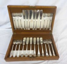 A vintage oak cased set of twelve each Mappin & Webb silver plated fish knives and forks