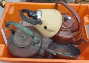 Two old kettles and a modern stove kettle