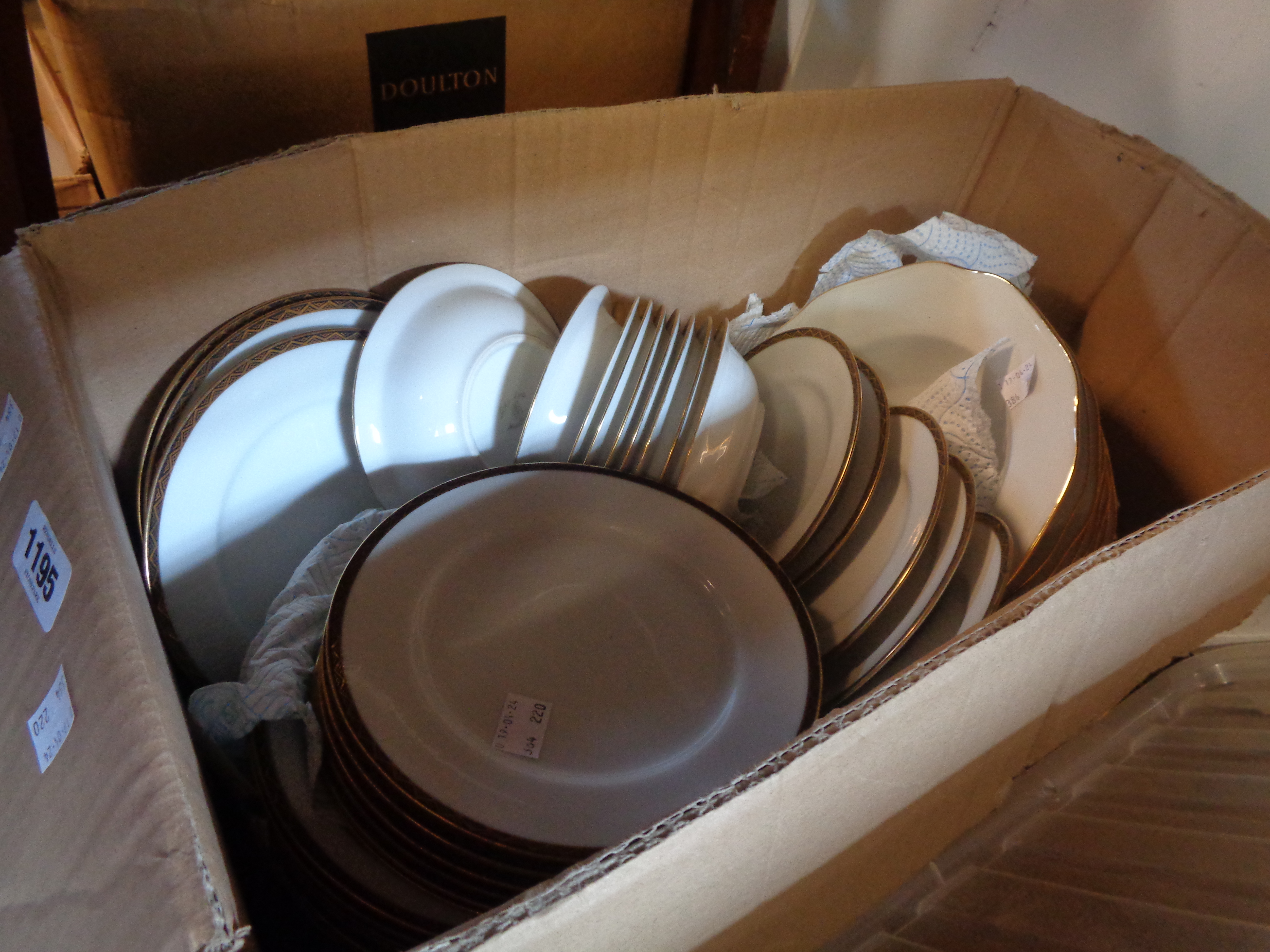 A box containing a quantity of Japanese porcelain tableware