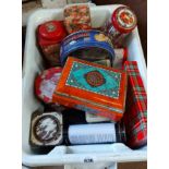 A crate of advertising tins including a Bluebird confectionary tin, etc.