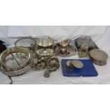 A crate containing a large quantity of assorted silver plated items including teaware, cutlery,
