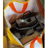 A bag containing a quantity of old tools including an old woodworking plane