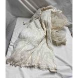 A vintage christening gown with lace decoration - sold with a vintage wedding veil