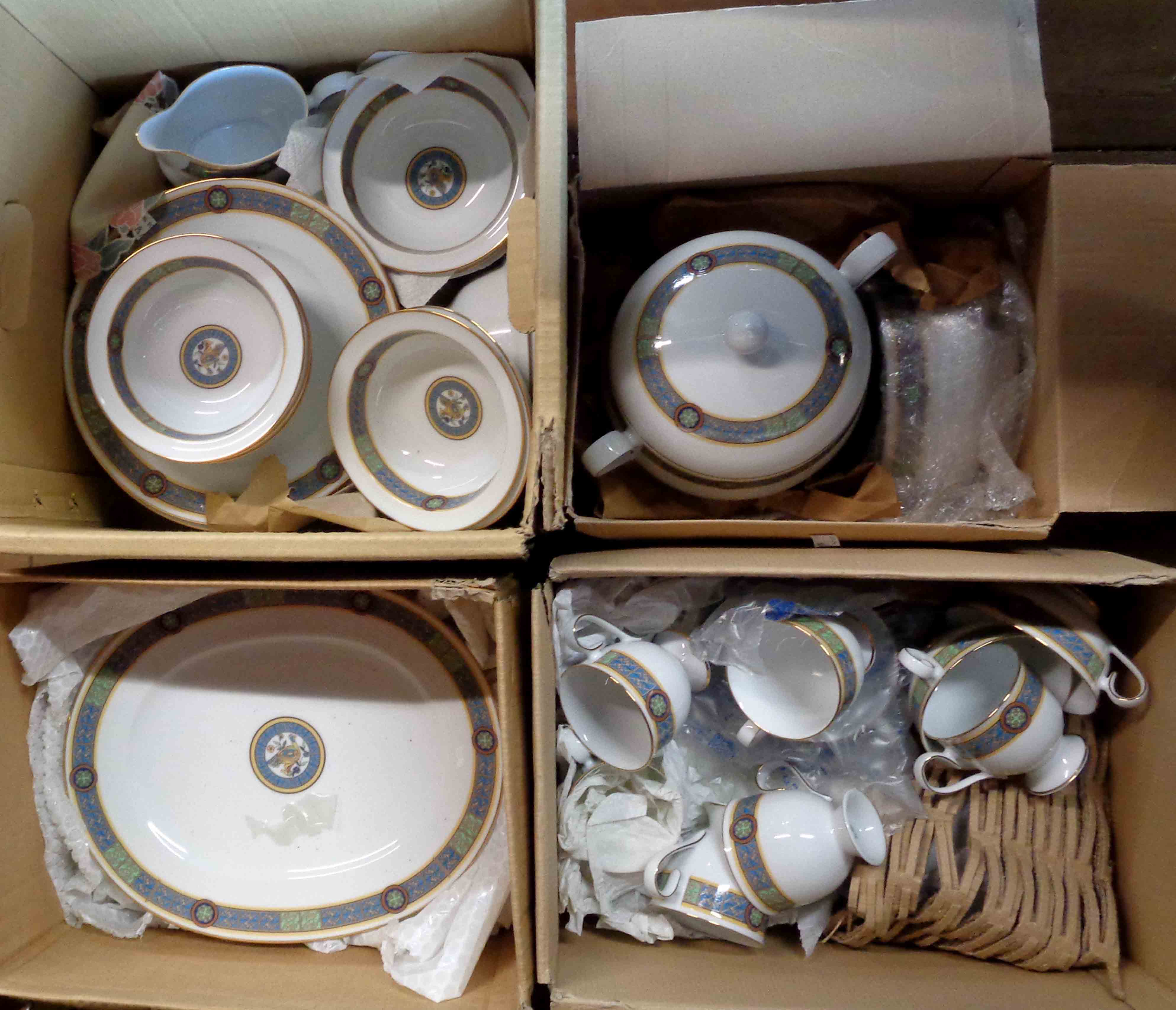 Four boxes containing a large quantity of Noritake porcelain tea and dinner ware including cups