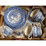 A box containing a quantity of blue and white tableware