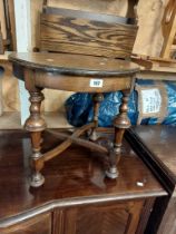 A 49cm diameter antique tea table with quarter veneered figured walnut top, set on turned legs