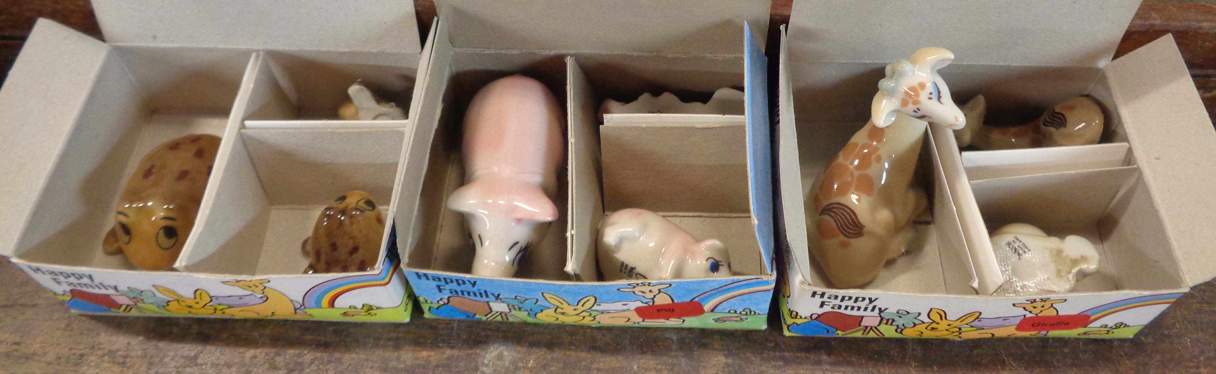 Three boxed Wade 'Happy Family' sets comprising Pig family, Giraffe family and Frog family