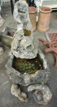 A concrete otter fountain - sold with two other otter ornaments