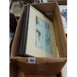 A box containing a set of eight framed topographical prints