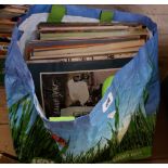 A bag containing a quantity of LP records