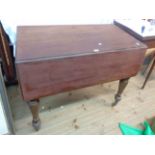 A 1.14m 19th Century mahogany Pembroke table with drawer to one end, set on turned legs with brass