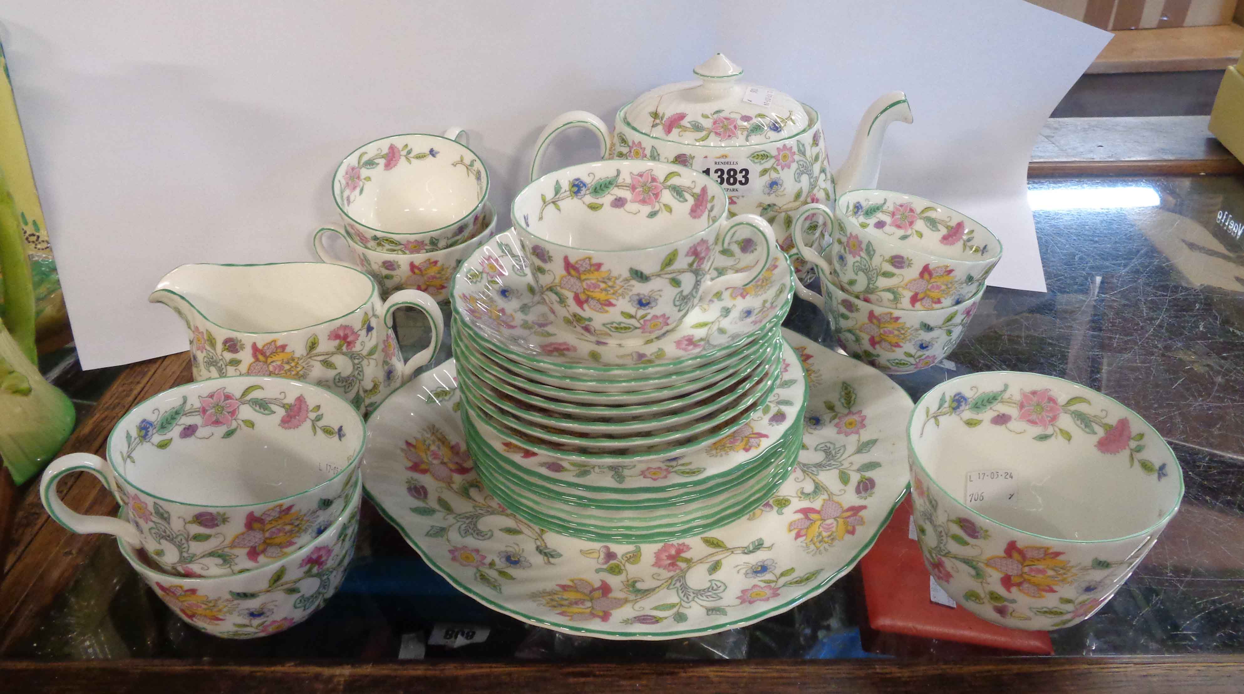 A quantity Mintons bone china teaware, decorated in the Haddon Hall pattern including teapot, (lid