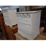 A pair of modern white painted bow front bedside chests of three drawers, set on bracket bases