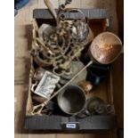 A box containing a quantity of metalware including two vintage brass Menorahs, chestnut roaster,