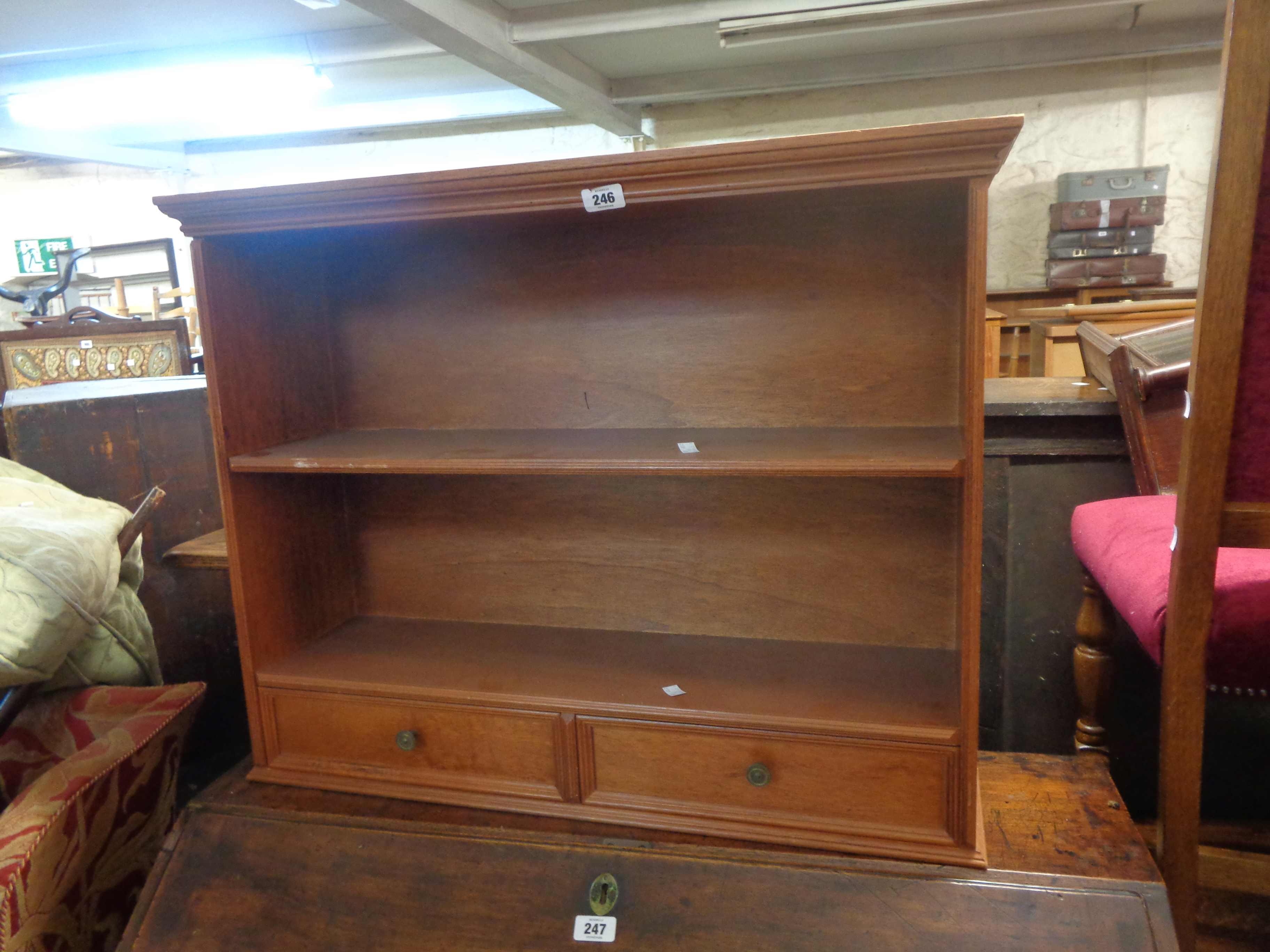 An 82cm modern mixed wood wall hanging open shelf unit with two short drawers under