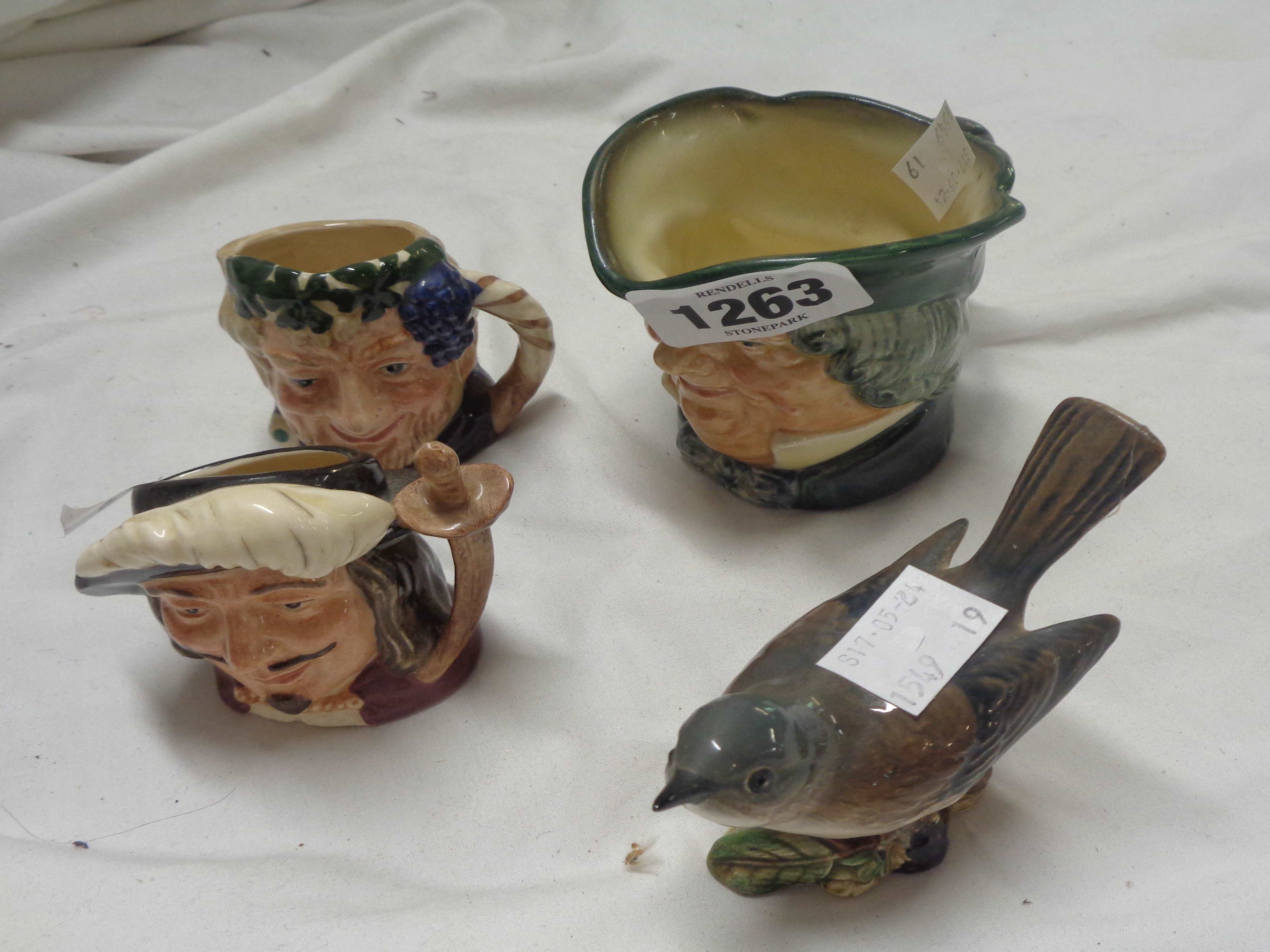 Three small Royal Doulton character jugs - sold with a Beswick pottery Whitethroat figurine