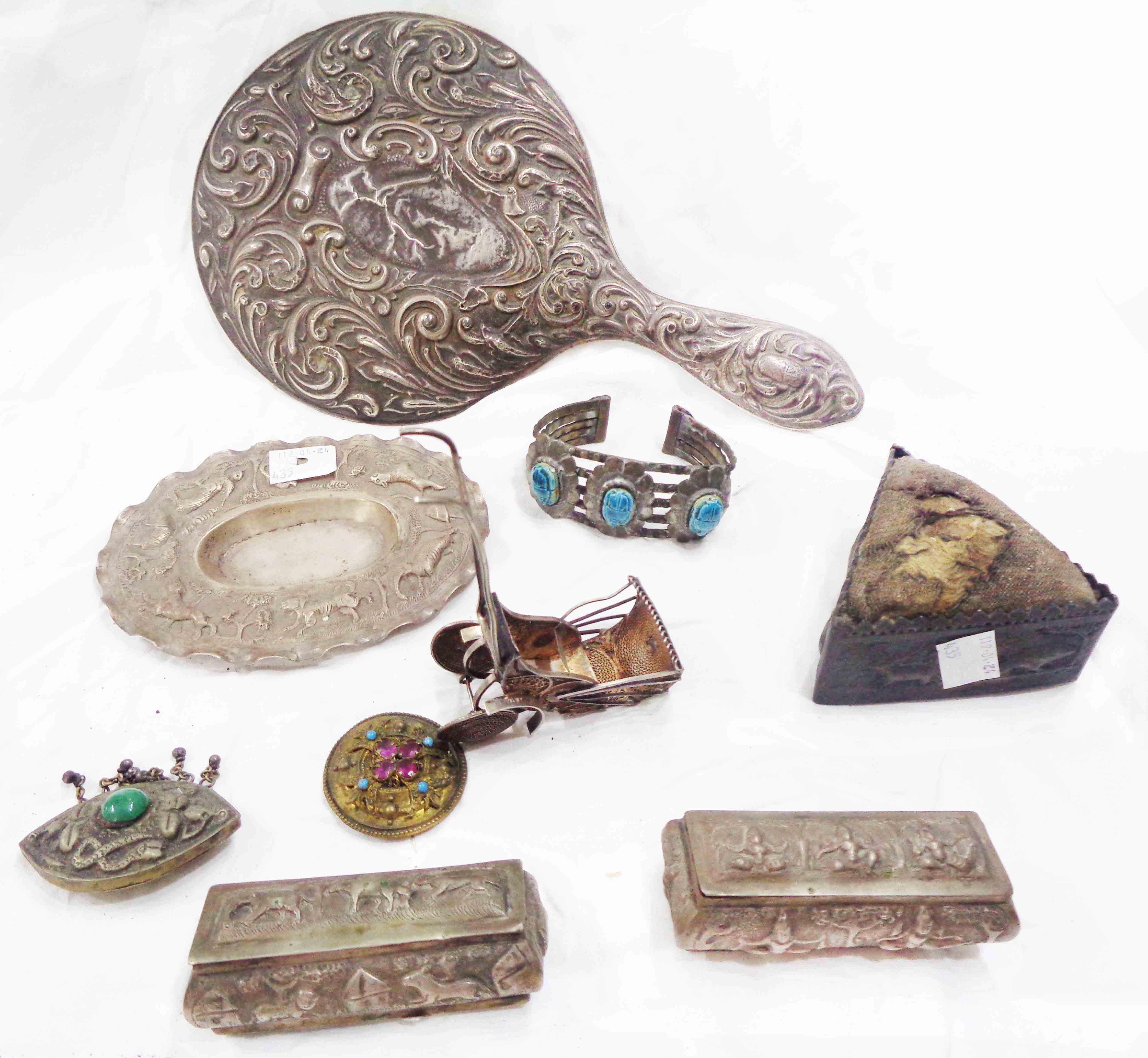 A bag containing Anglo-Indian white metal items including two oblong trinket boxes and triangular