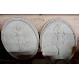 Four oval plaster plaques, depicting classical maidens