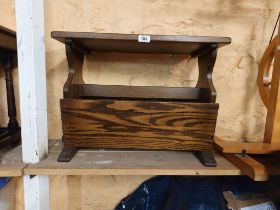 A 61cm vintage Webber Furniture oak magazine rack