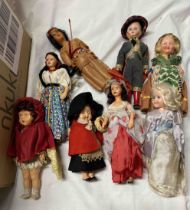 A box containing a quantity of 1950's and 60's souvenir costume and other dolls