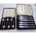 A cased set of six silver coffee bean spoons - sold with a cased set of six silver handled tea