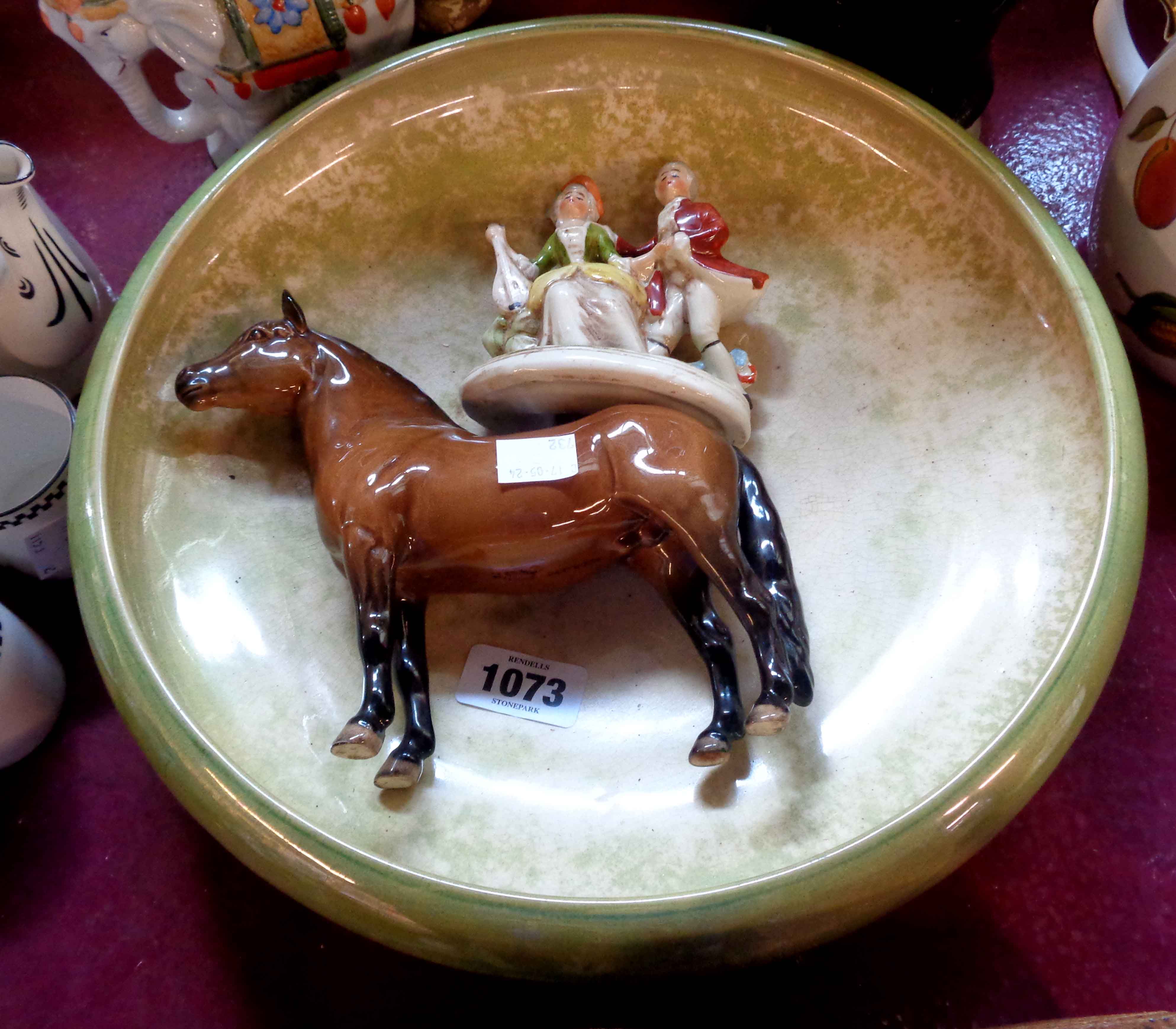 A large Moorcroft pottery bowl with applied green lustre finish - sold with a Beswick horse and a