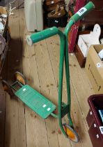 A vintage green Bantel child's scooter