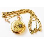 A vintage Waltham ornate gold plated cased hunter pocket watch with applied contrasting detail and