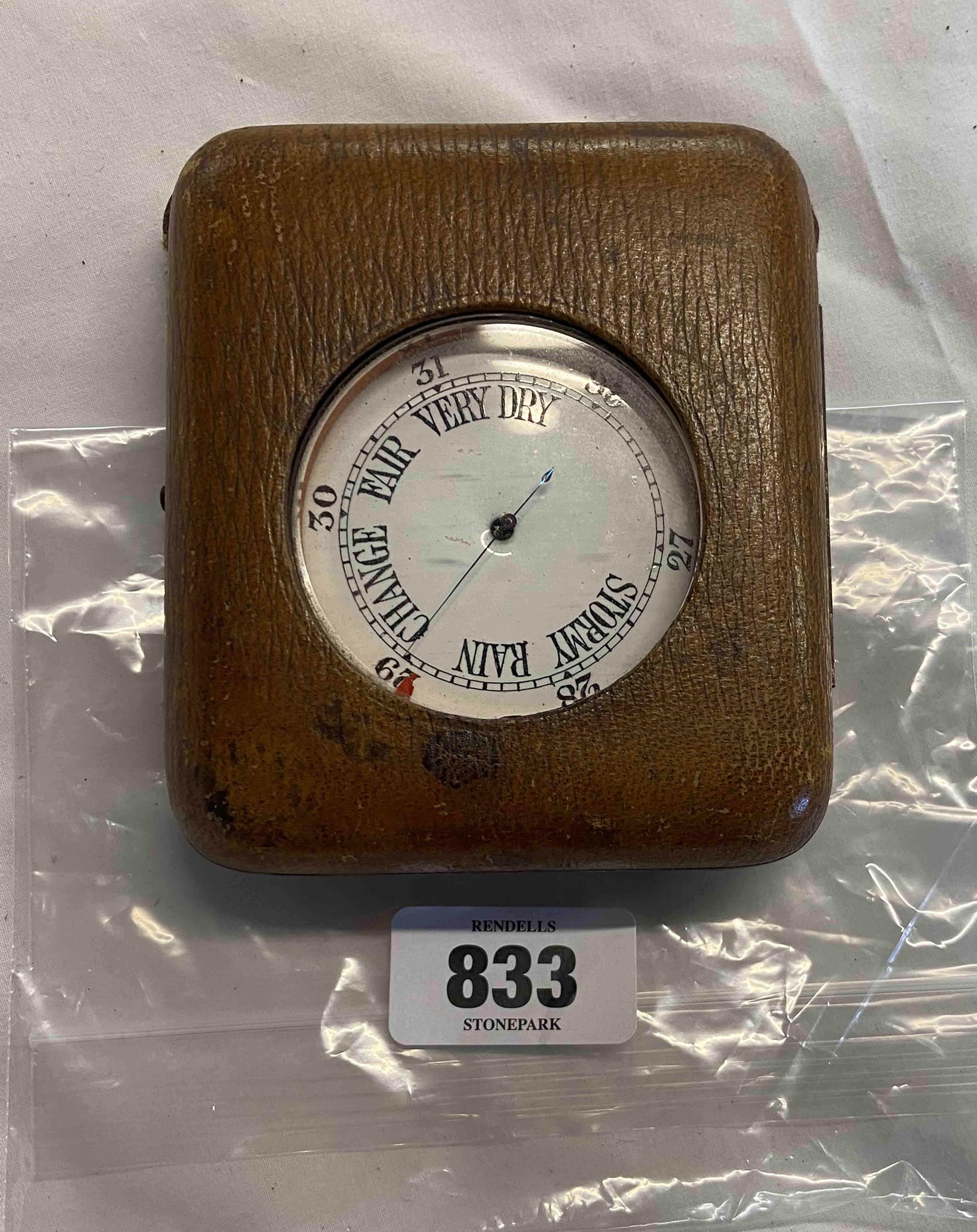 A steel cased pocket barometer in travelling case